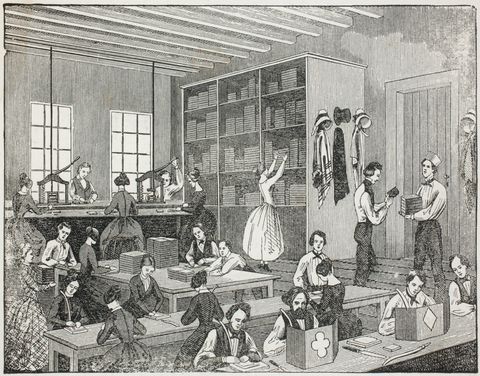 Print. Twenty-three men and women with pale skin work at benches or fetch materials or products in a high-ceilinged workroom in this engraving. The women wear a dress and most men wear a white shirt, neck tie, and vest. 